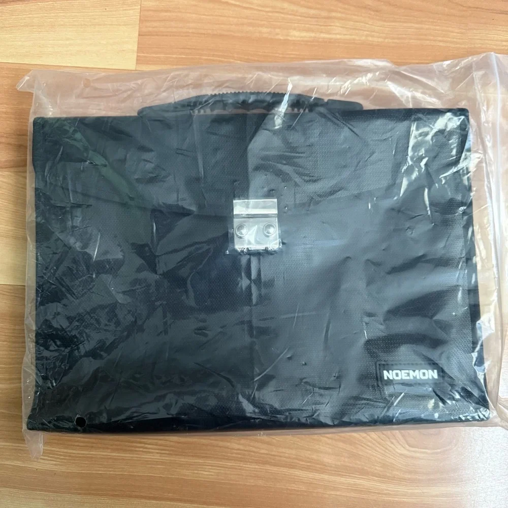 Noemon Black Briefcase Bag – New, 25 Pockets, Never Used